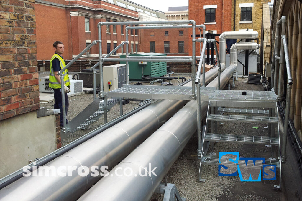 London – hopover walkway over services on roof. Access fabricated and installed by Simcross Welding Services, Abbots Langley, Watford