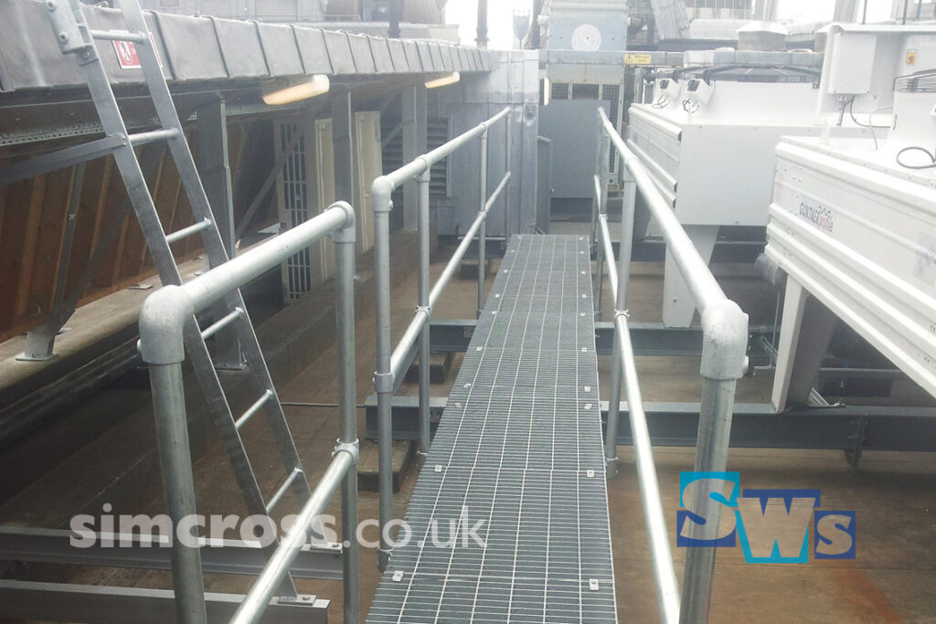 London – hopover walkway over services on roof. Access walkway fabricated and installed by Simcross Welding Services, Abbots Langley, Watford, North London