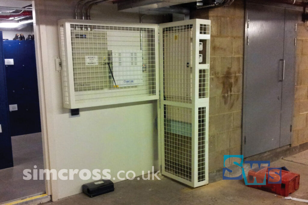 London – cage with gate to protect services. Simcross Welding Services bespoke metalwork London and Herts