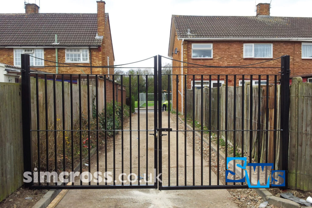 Watford – double gate access to private garages.