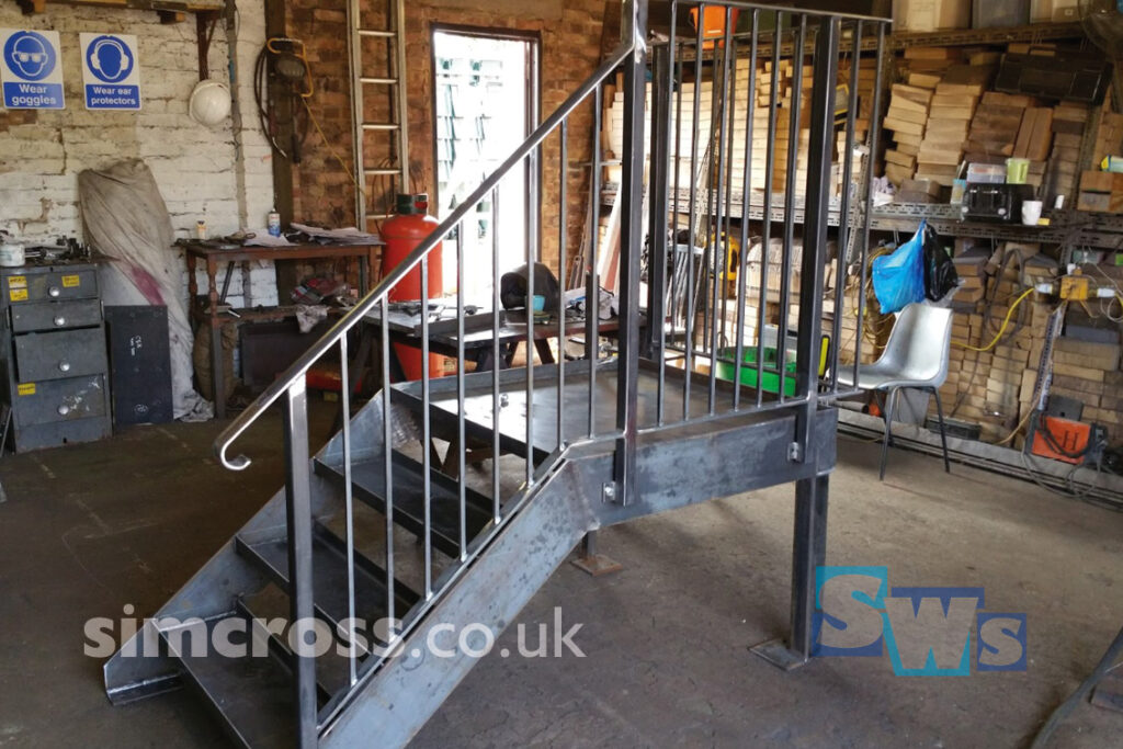 Steel fabricated steps with handrail, constructed in our workshop in Abbots Langley, Watford, Herts WD5 0PL